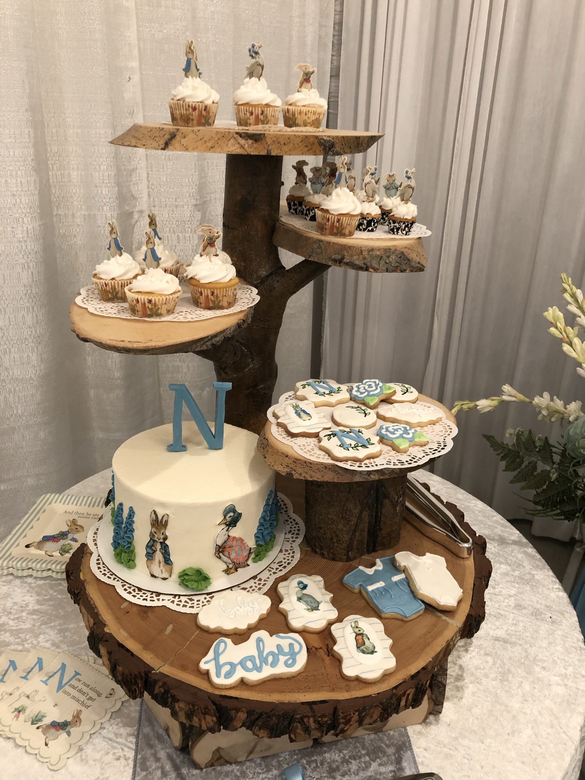 Cake and cupcakes and cookies with the Peter Rabbit theme